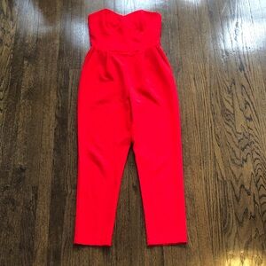 Adelyn Rae Vibrant Colorful Red Pockets Strapless Jumpsuit with Rubber Neckline